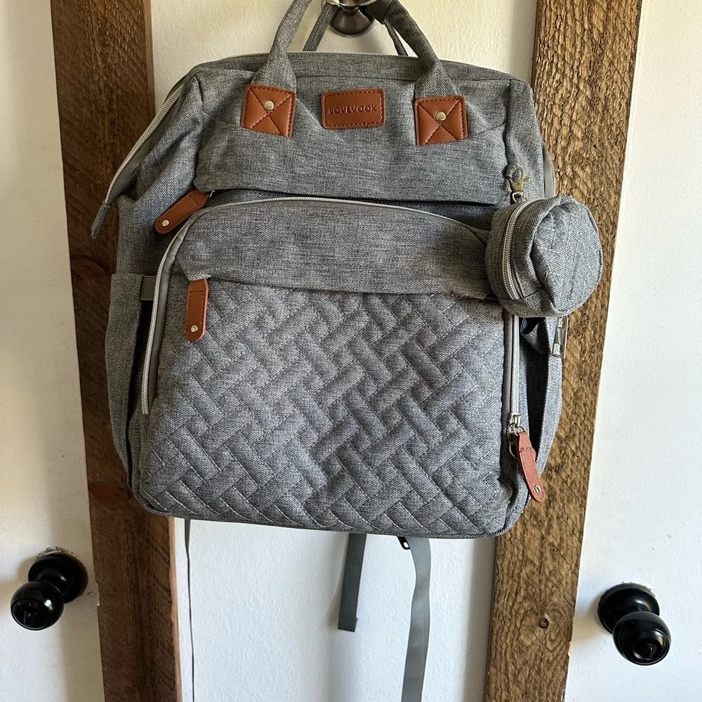 Boutique Large Diaper Bag, Backpack, Bassinet, Tech Charging Station all in one